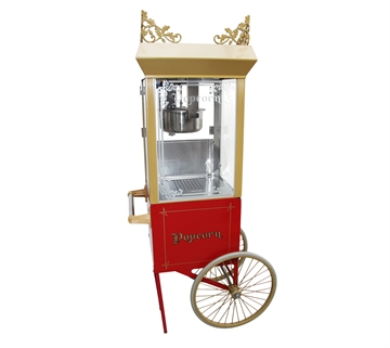 Antik popcornmaskine med vogn
